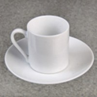 Tasse à café  avec soucoupe et cuillère à moka